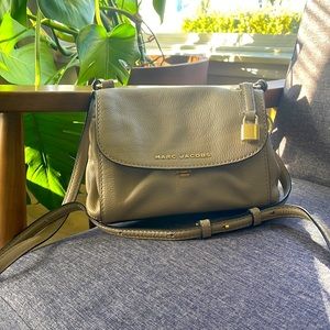 Lightly used Marc Jacobs cross body bag. Light beige leather.